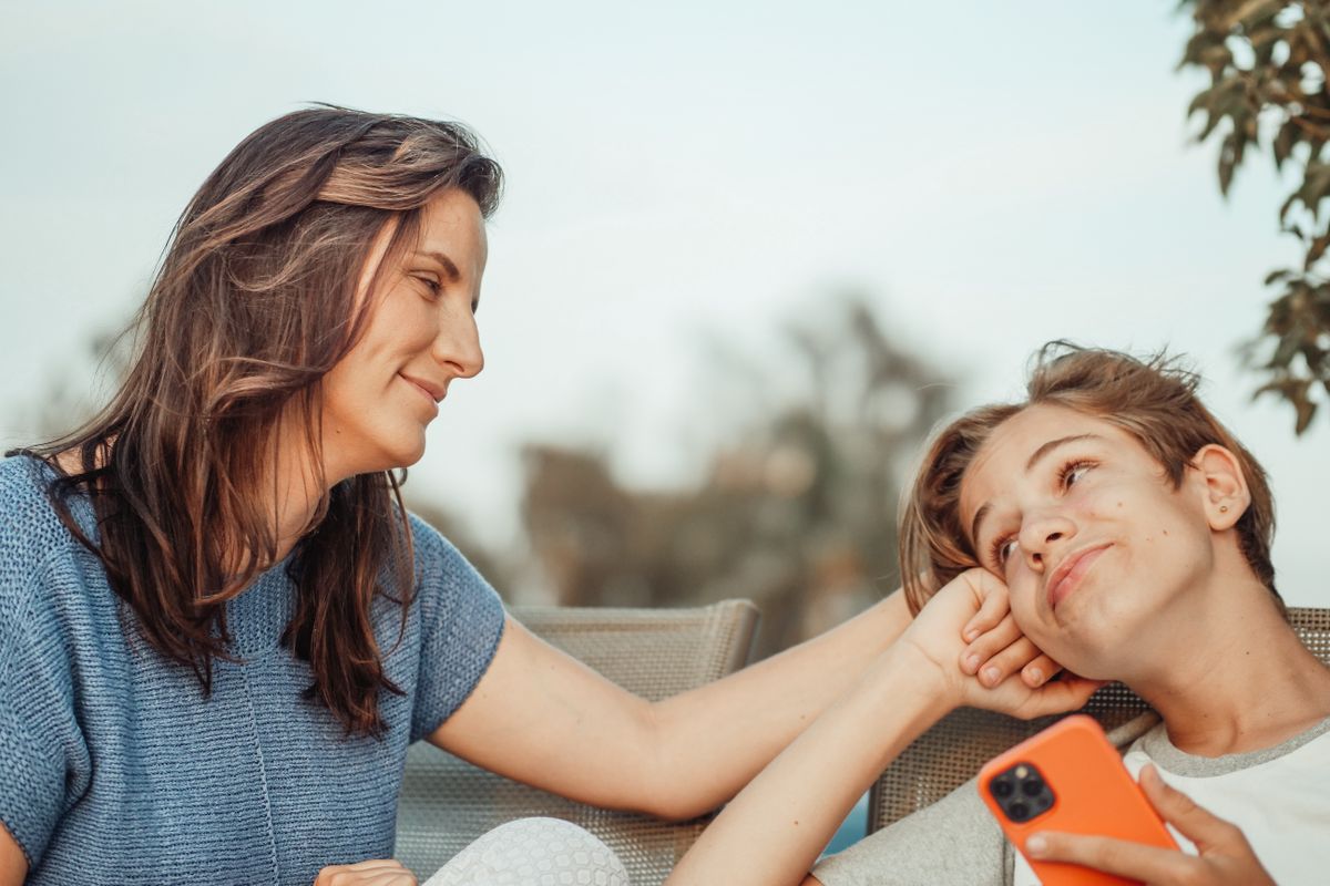 A parent and teen spending time together outdoors